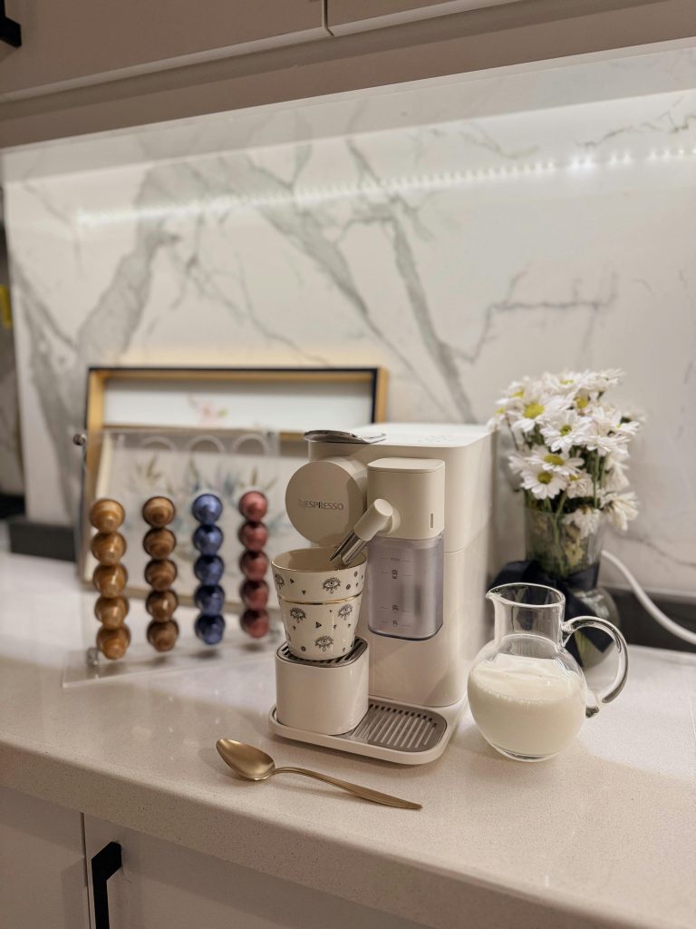 Coffee machine and coffee pods on counter
