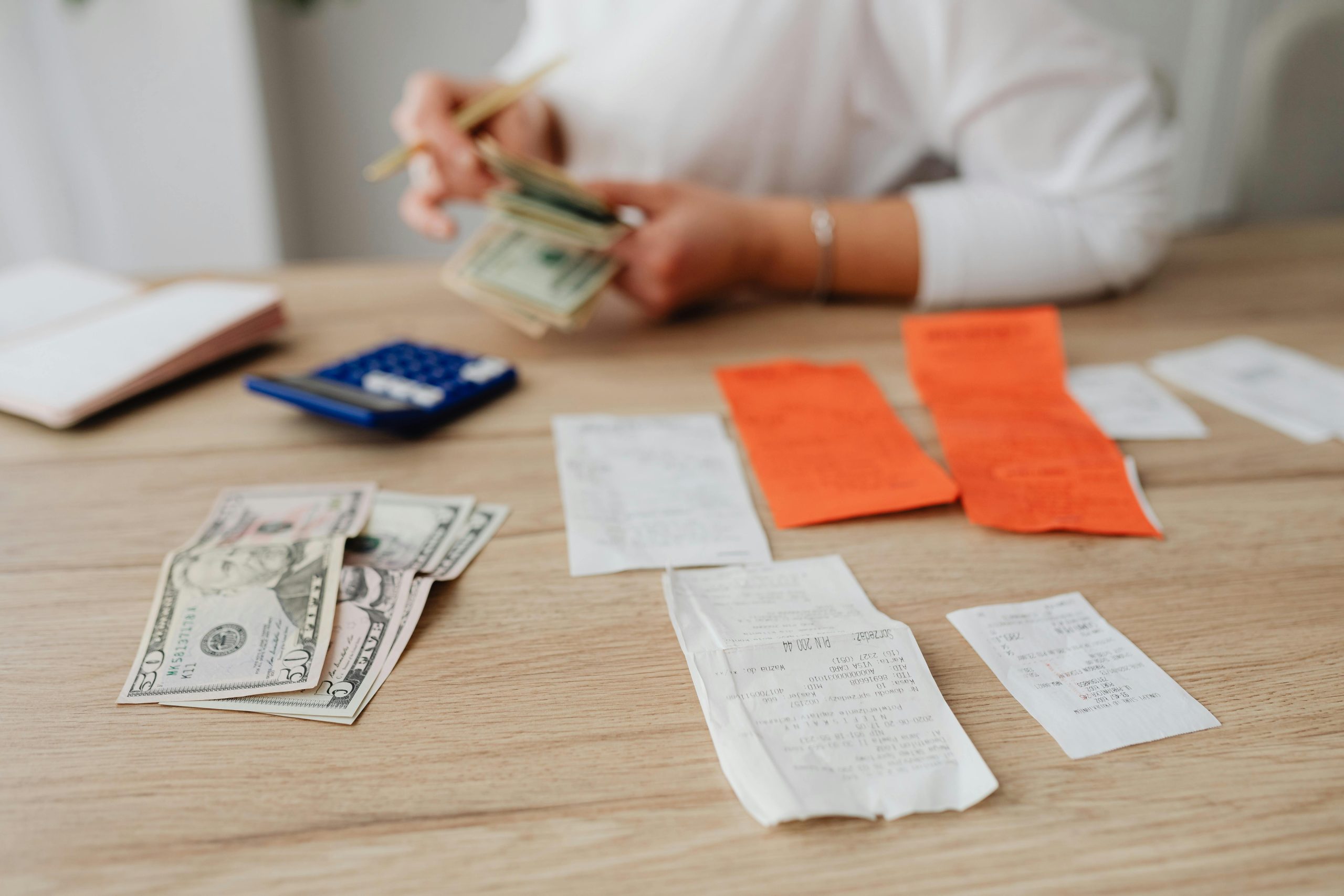 Weekly budget planning and checking bills as part of a Sunday money reset routine