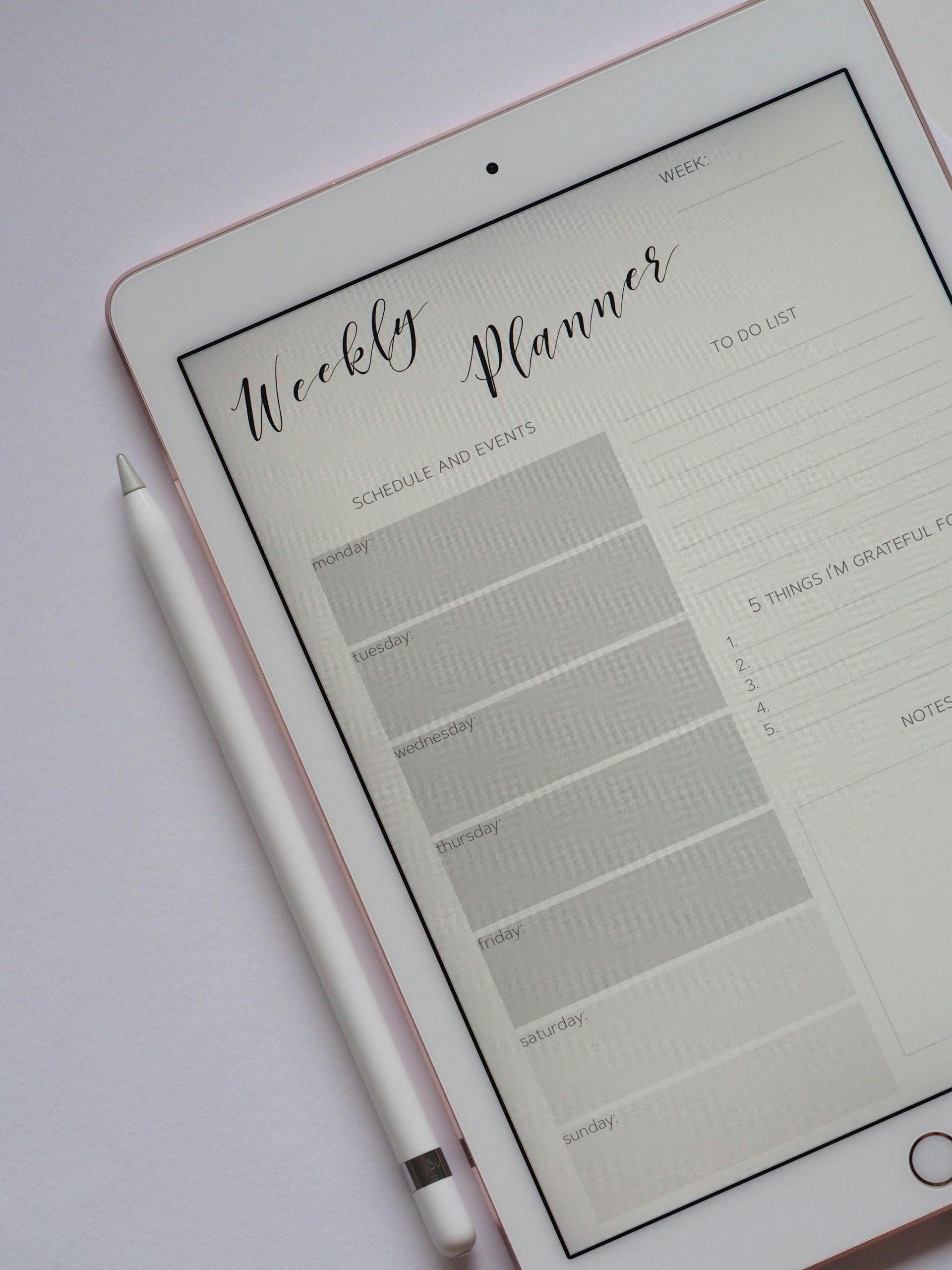 Weekly planner and calendar used to plan the upcoming week during a Sunday reset routine